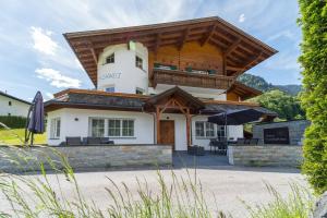 a building with a roof on top of it at Haus Muntschnei in Sankt Gallenkirch