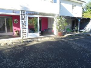 a house on the side of the road at La Clef De Voute Amethyste in Saint-Genest