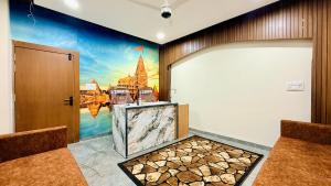 a room with a door and a painting on the wall at JB Resort in Mhow