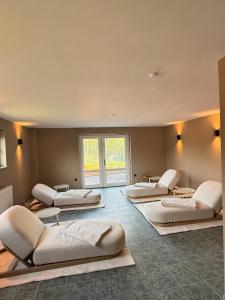 a room with four beds in a room at Pinnø - Padel Hotel Food in Pinnow