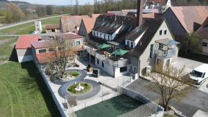 an aerial view of a house with a yard at alla Papa in Obernzenn