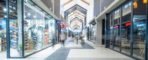 a shopping mall with people walking through the aisle at The Willow Whispers guest house in Gqeberha