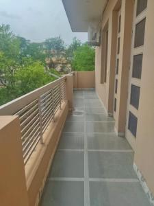 a balcony of a building with a view at Om Homestay in Panchkula
