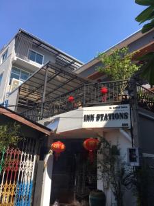 a building with a sign that says im photons on it at Inn Stations Hostel in Bangkok +28 photos