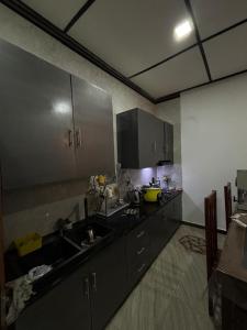 a kitchen with a sink and a counter top at Casa Bella Home in Ja-Ela