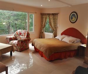 Cama ou camas em um quarto em Familia Piatti B&B - Suites