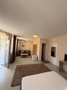 a living room with a couch and a table at Top Center House in Plovdiv +6 photos