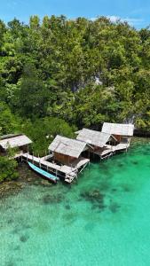 an aerial view of a resort in the water at BRIGHT Guest Hause in Besir