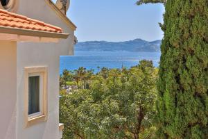 a view of the ocean from a building at Mavi Kıyı Suites in Kaş