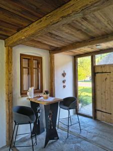 a room with a table and two chairs in it at Das Kothberg in Lunz am See