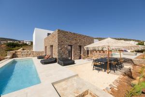 an image of a villa with a swimming pool at Antiparos Gems - The villa in Antiparos