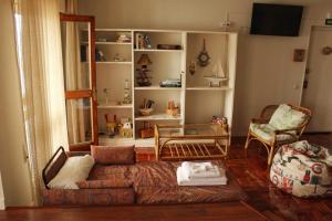 a living room with a couch and a table at salinas playa in Salinas