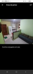a picture of a living room with a couch at casa em Vila Verde Búzios in Búzios