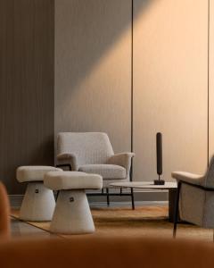 a living room with two chairs and a coffee table at LEGooT HOTEL in Khamis Mushayt +22 photos