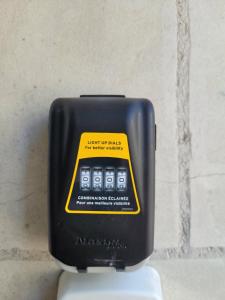 a small electronic device with a yellow sticker on it at Appart 1er étage Angers Chalouère in Angers