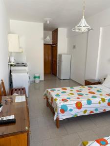 a small kitchen with a bed in a room at Smalis Studios in Lakkíon