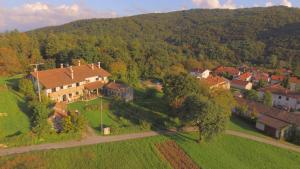 an aerial view of a house in a village at Silentium Domus in Gornje Vreme