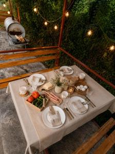 a table with a tray of food on it at Syuzn Resort in Goris