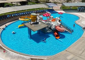 an overhead view of a water park with a water slide at Kankay Hotel y Centro de Convenciones in Cieneguilla +30 photos