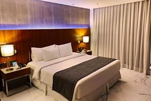 a bedroom with a large bed in a hotel room at Hotel Nacional in Rio de Janeiro