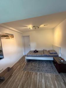 a bedroom with a bed in a room at Sweethome - Köln Messe in Bergisch Gladbach