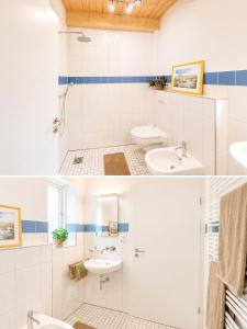a bathroom with two sinks and a shower at Ferienhaus an der Lohheide in Walsrode +7 photos