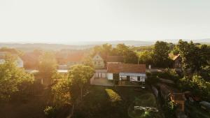an aerial view of a house in a village at Kuća za odmor Odvorci in Jakačina Mala