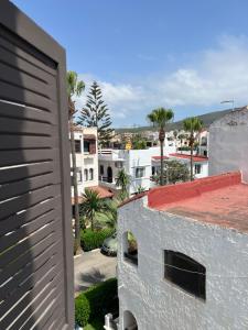 a view of a city from a building at Casa Mouna in Cabo Negro