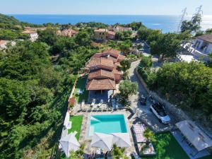 an aerial view of a house with a swimming pool at Paradise House in Maratea