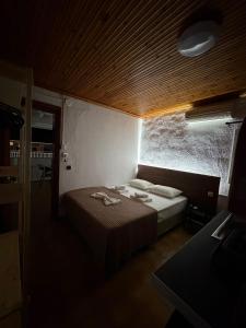 a bedroom with a bed in a room at Kiki by the sea Villa in Paralia Katerinis