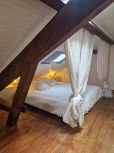 a bedroom with two beds in a attic at COTTAGE - Utopy Hostel in Capbreton