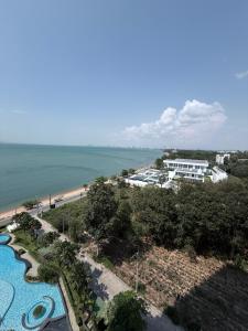 an aerial view of a resort and the ocean at Del Mare Bangsaley condo in Bang Sare