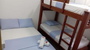 a bunk bed room with two bunk beds in it at Hotel Panther Resort in Necoclí