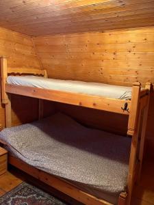a inside of a sauna with a bunk bed at Vikendica Lovinovic Vlasic in Šišava