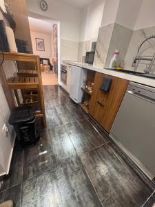 a kitchen with a sink and a counter top at Large studio in Obernai in Obernai +26 photos
