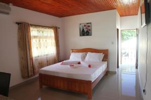 Postel nebo postele na pokoji v ubytování Tourterelle Holiday Home
