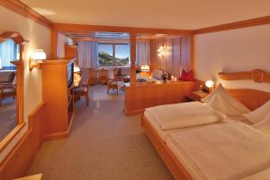 Posteľ alebo postele v izbe v ubytovaní Hotel Omesberg