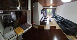 an aerial view of a living room with a couch at Apart Wilma in Encarnación