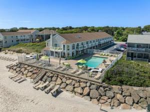 an aerial view of a resort with a swimming pool at The Corsair & Cross Rip Oceanfront in Dennis Port