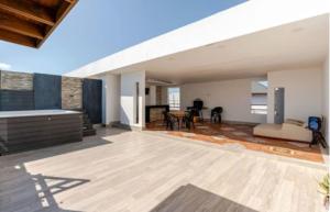 Gallery image of Penthouse con Terraza privada, Jacuzzi y BBQ in Mandinga