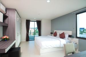 Postel nebo postele na pokoji v ubytování VC Residence - Chon Buri