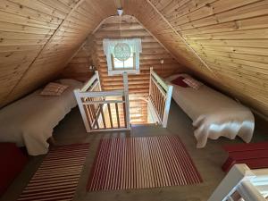 an overhead view of a bedroom in a log cabin at Kesäpesä in Artjärvi
