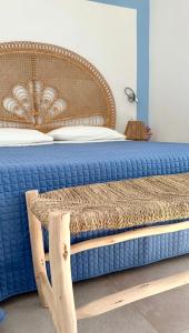 a bedroom with a bed with a blue mattress at Salento astrea vista mare in Porto Cesareo +112 photos