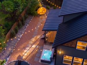 an overhead view of a house with a swimming pool at Rainier Spa Cabin 7 Minutes to Park in Ashford