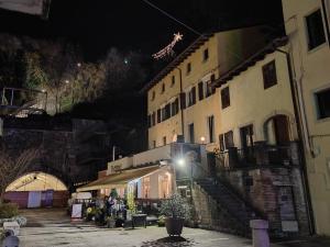 a building with a star on top of it at night at Sottocastello 1 in Gorizia