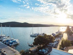 a group of boats parked in a marina at Irene Bed & Breakfast Tisno in Tisno