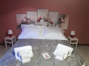 A bed or beds in a room at Il Piccolo Principe