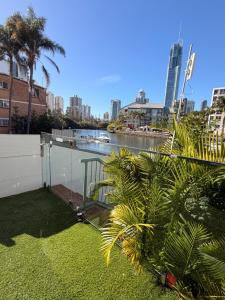 a balcony with a view of a river in a city at Surfers 641 in Gold Coast