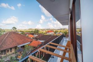 a view from the balcony of a house at Pondok Bingin Guest House in Bingin Beach