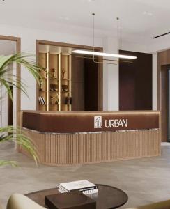 a lobby of a hotel with a reception desk at Urban Hotel Ethno in Bishkek